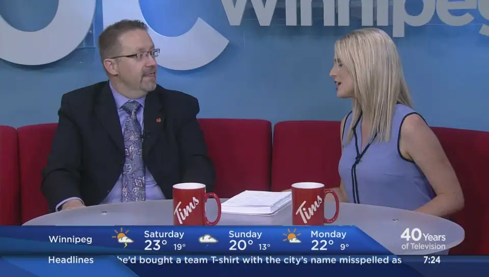 family watching tv 4k living room winnipeg home