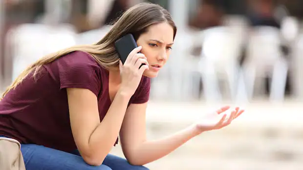 frustrated canadian customer on phone with call center