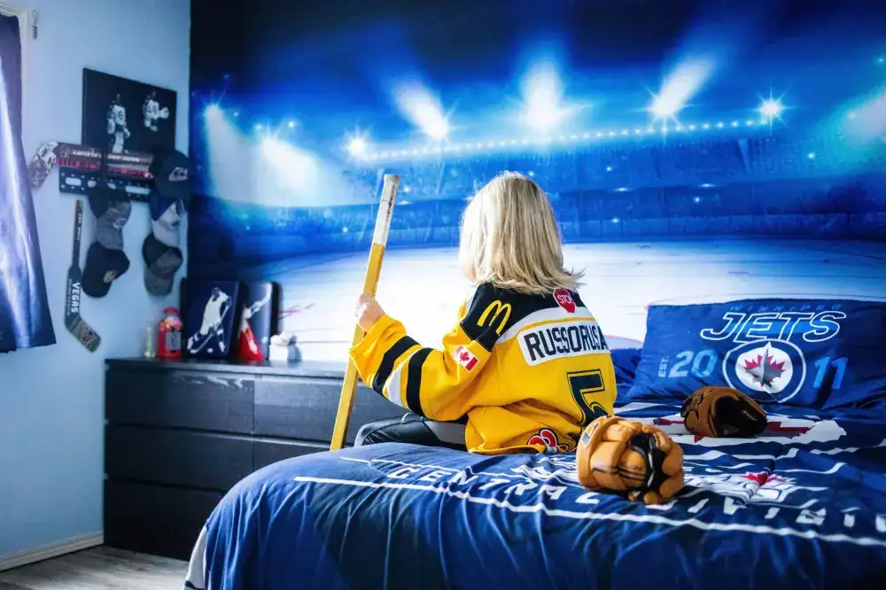 person watching hockey on iptv 4k winnipeg home