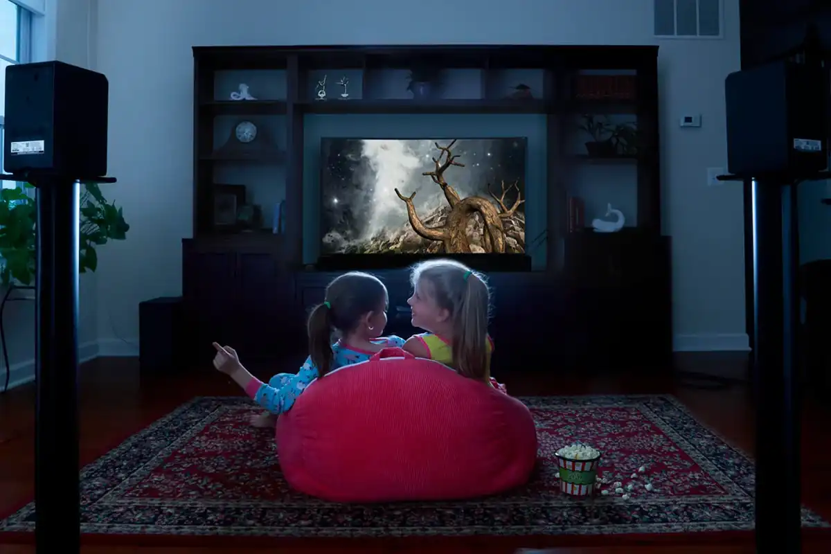 family watching TV in Canada living room